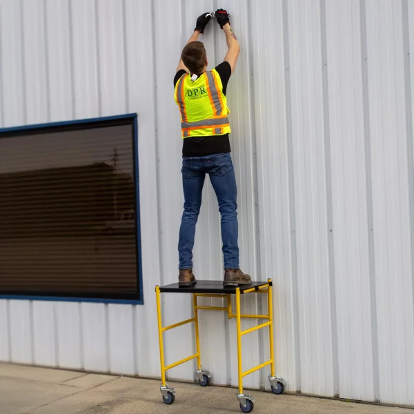 3 foot Utility Scaffold being used as a platform for maintenance.