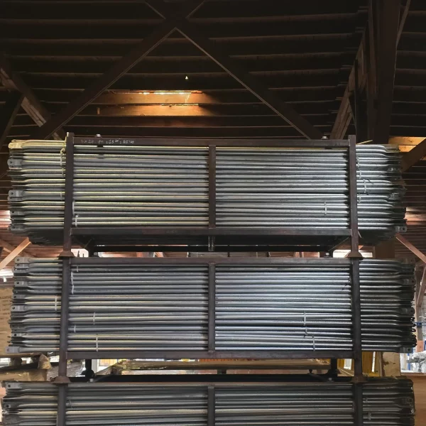Scaffold Cross Brace Racks with cross braces stacked.