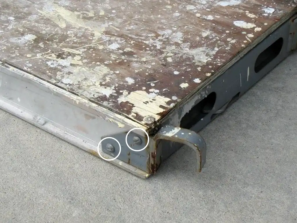 Steel Hooked Walkboard with small screws holding it together.