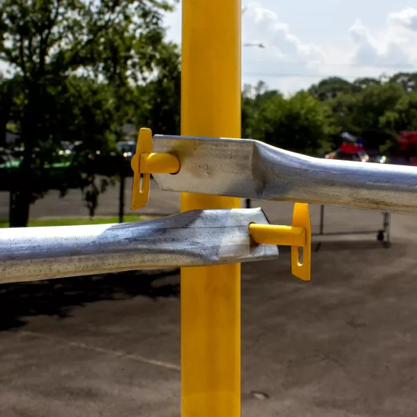 Scaffolding safety rail center connections using a Spacelock.